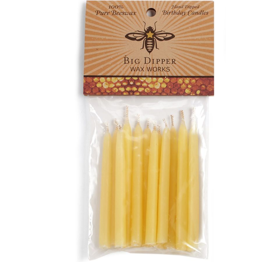Pack of yellow candles with 'Big Dipper Wax Works' packaging on a white background