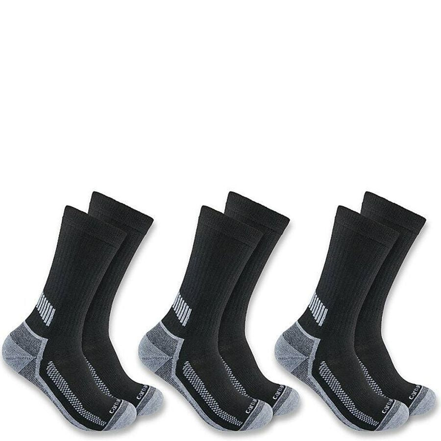 Six black crew socks with gray accents on the toes, heels, and arches, arranged in three pairs against a white background. The brand name "Carhartt" is visible in small white lettering on the toe of each sock.