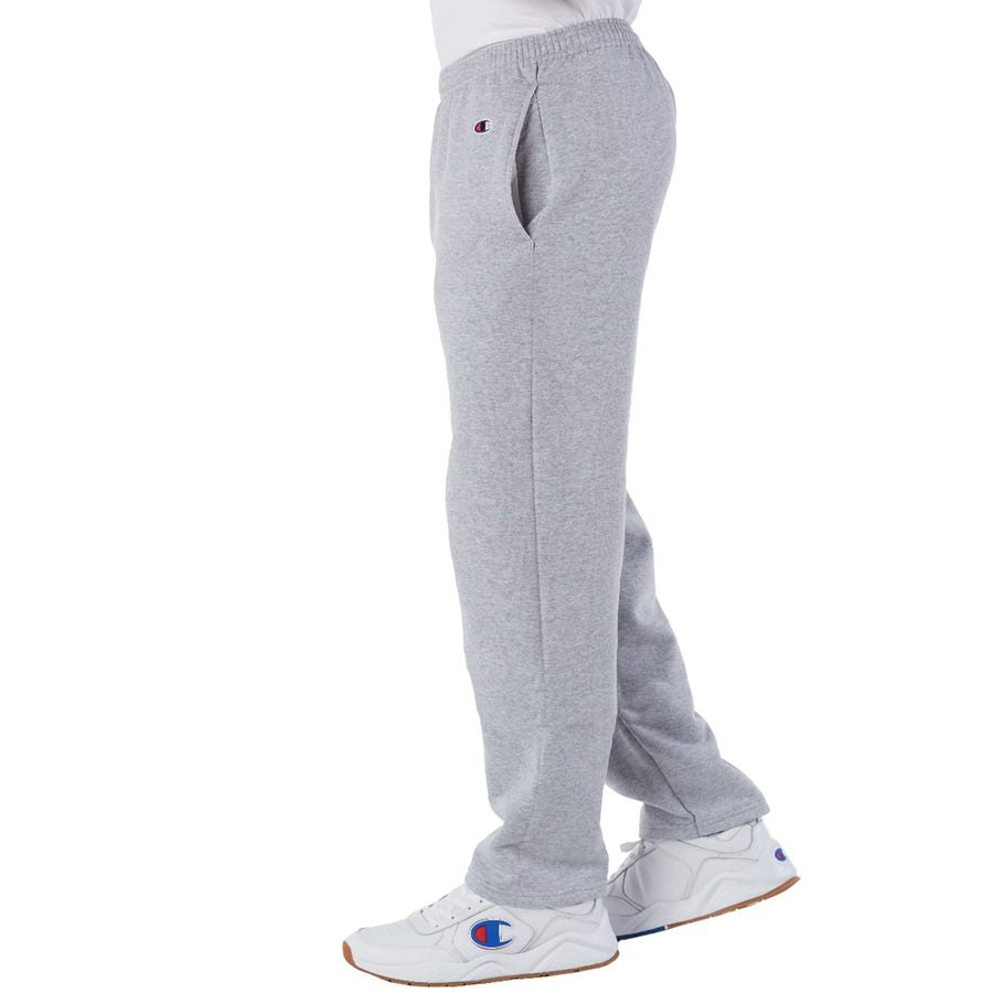 Gray sweatpants with a Champion logo on a white background