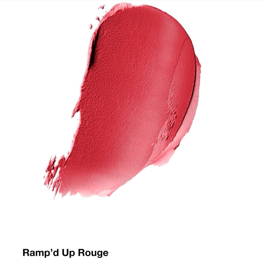 Close-up of a swatch of Ramp'd Up Rouge lipstick on a white background