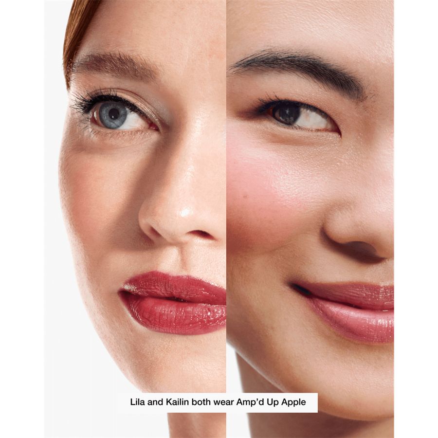 Two close-up views of a woman's face with different lip colors, labeled 'Amp'd Up Apple'.