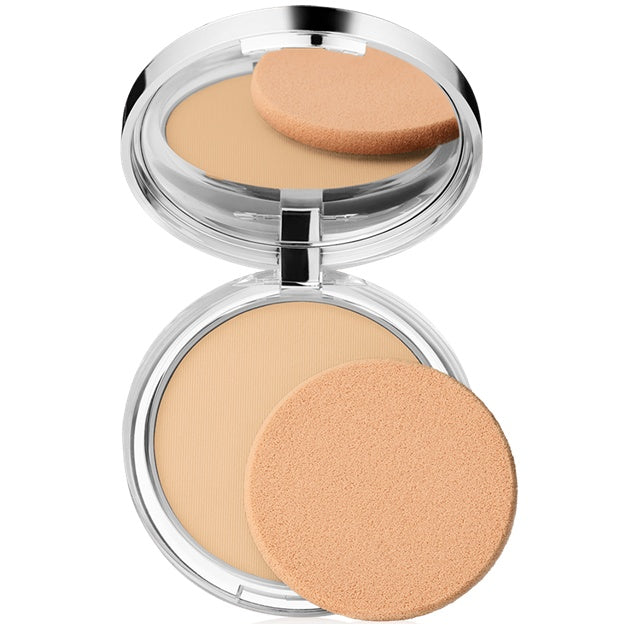 Compact powder with a sponge applicator on a white background