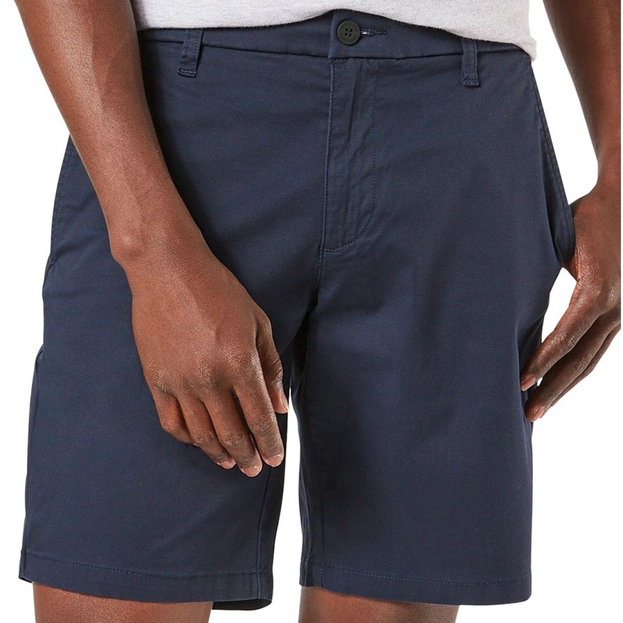 Navy shorts worn by a person on a white background