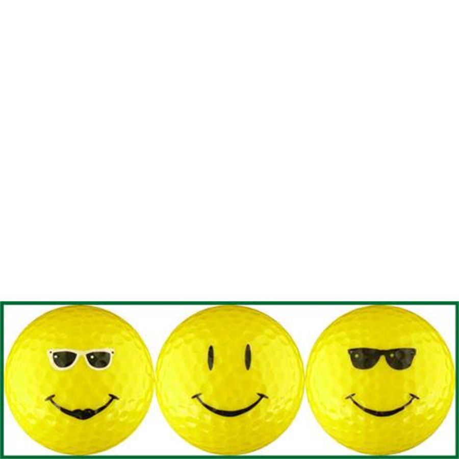 Three yellow golf balls with smiley face designs on a white background