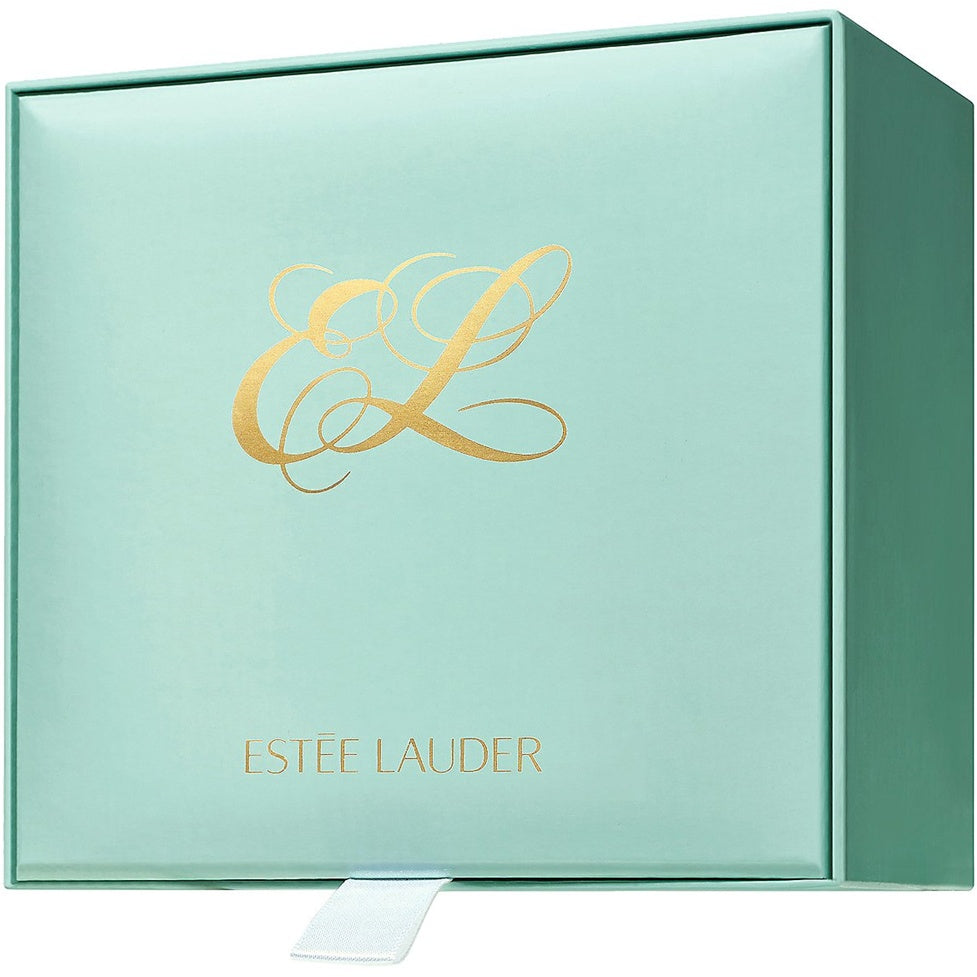 Estée Lauder product packaging box with gold logo and text on a light green background