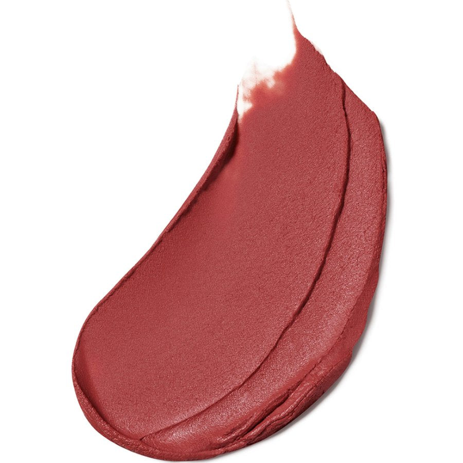 Close-up of a swatch of red lipstick on a white background