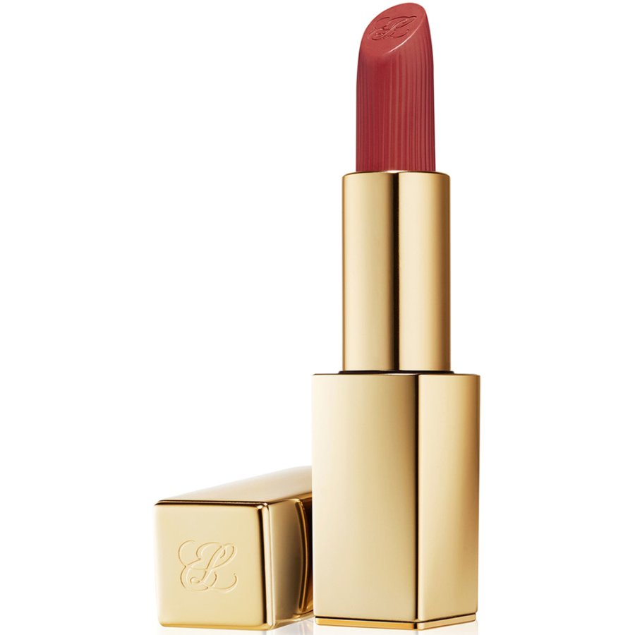 Gold lipstick with red shade on a white background
