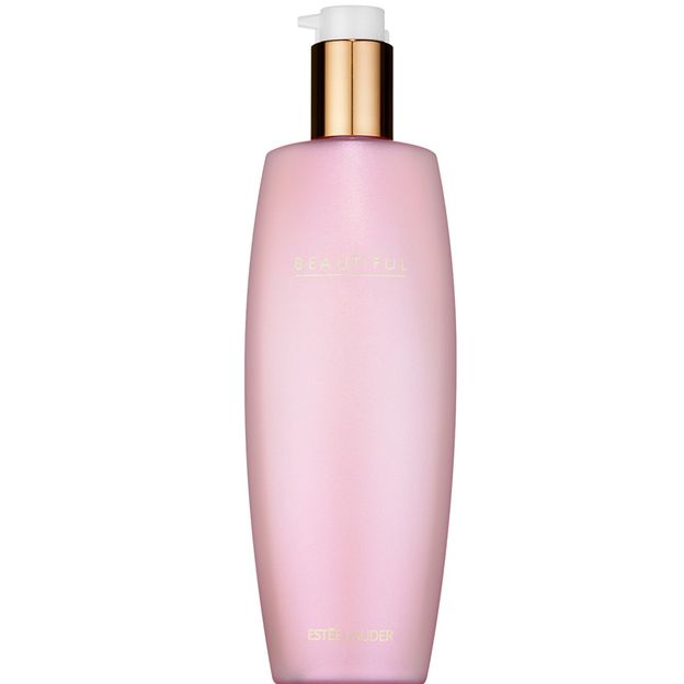 Pink bottle with gold cap on a white background