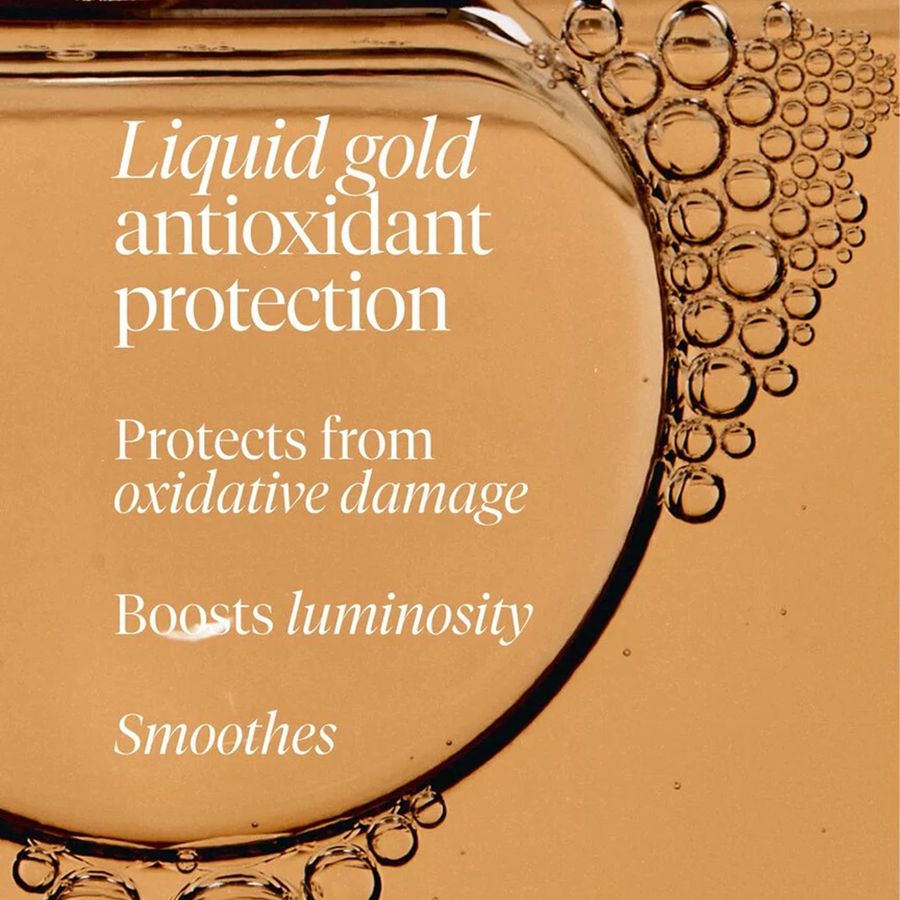 Liquid gold antioxidant protection: protects from oxidative damage, boosts luminosity, smooths. Close-up of golden-brown liquid with bubbles.