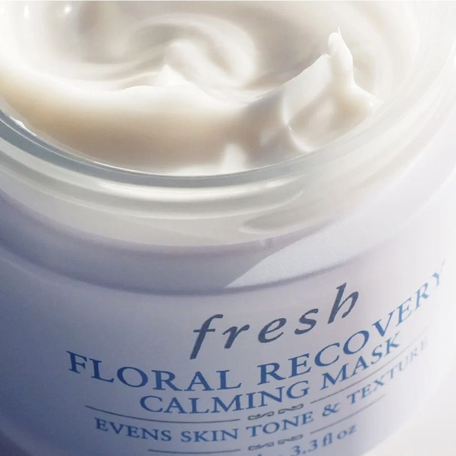 White creamy mask in a clear jar with "fresh" and "Floral Recovery Calming Mask" label.