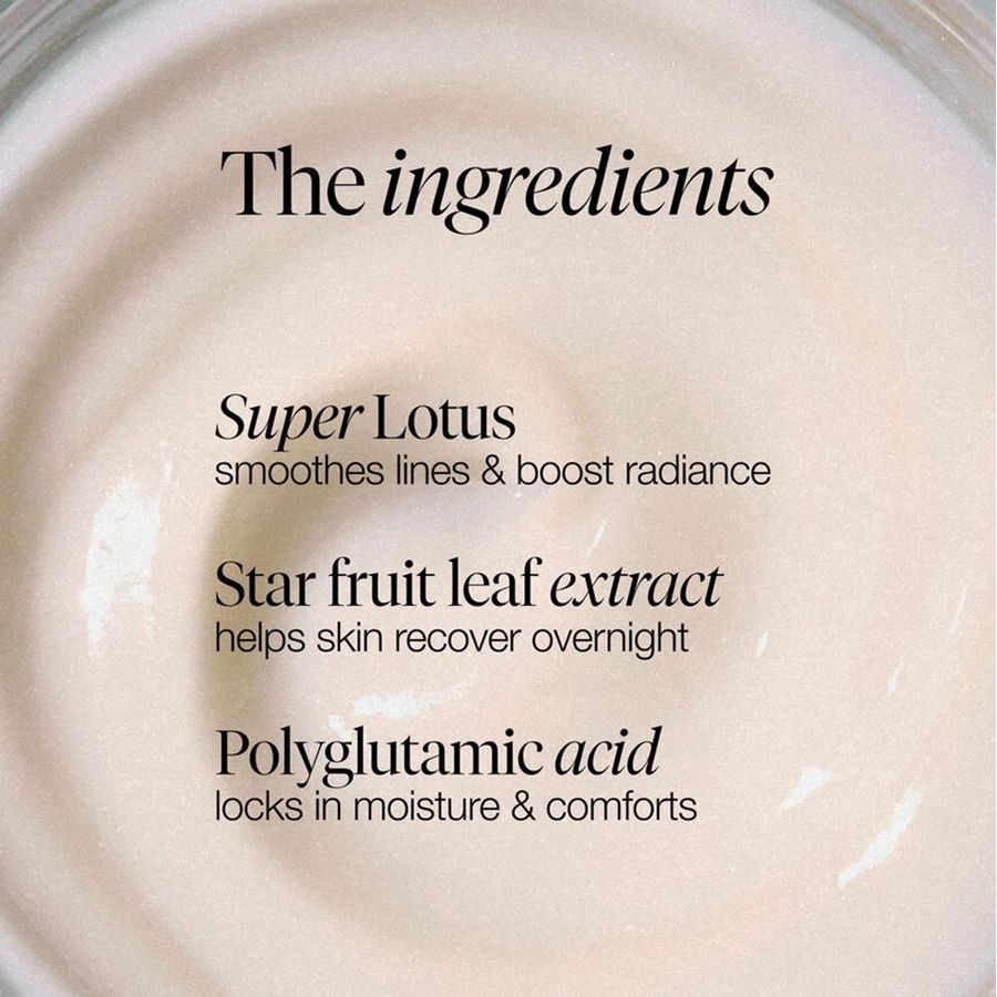 Close-up of a pale cream cosmetic product with black text reading 'The ingredients' and listing Super Lotus, star fruit leaf extract, and polyglutamic acid.