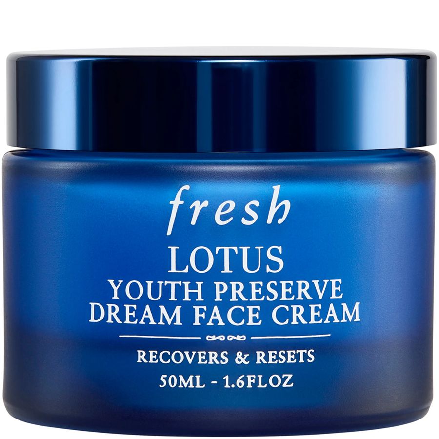 Fresh Lotus Youth Preserve Dream Face Cream in a dark blue jar with a matching lid, featuring white text on a clean white background.