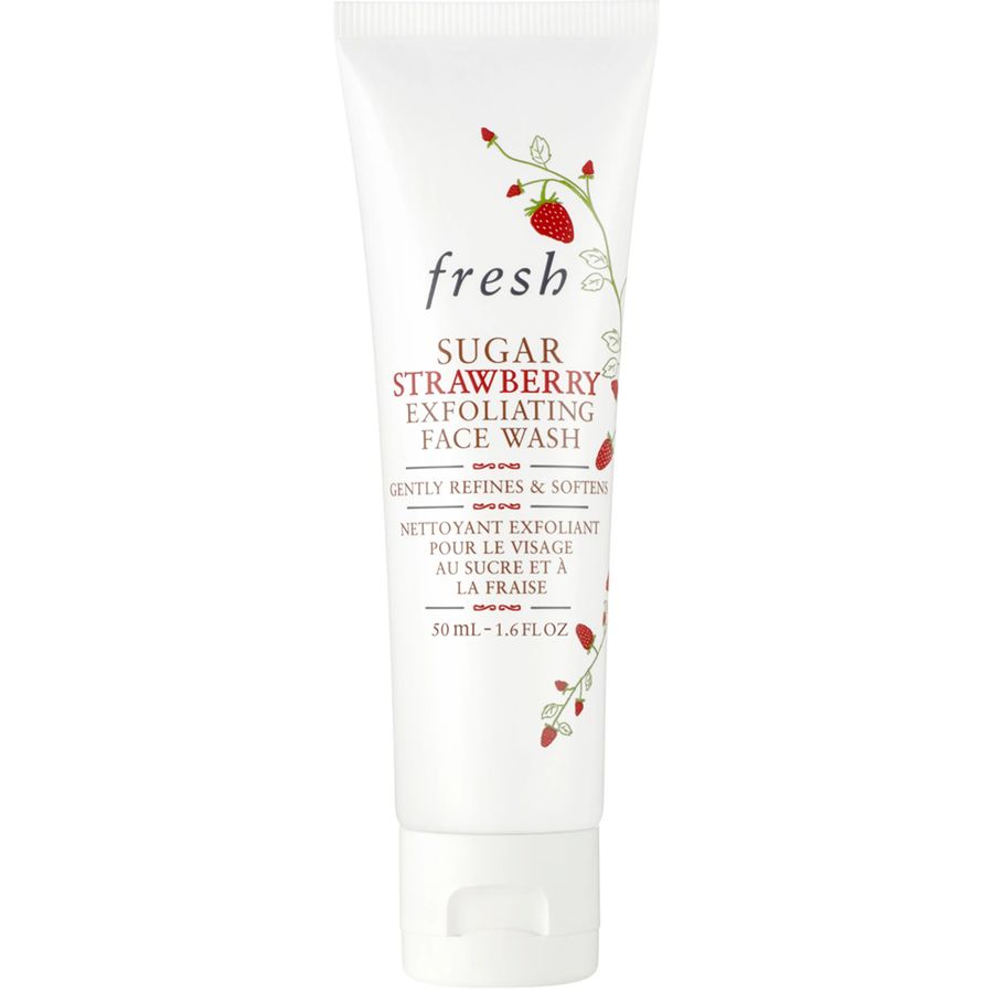 Fresh Sugar Strawberry Exfoliating Face Wash in a white squeeze tube with red strawberry illustrations and black and red text, on a plain white background.
