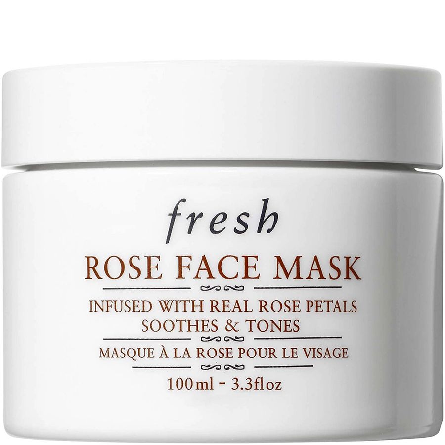 A white plastic jar of Fresh Rose Face Mask with dark brown and black text on the front, set against a plain white background.