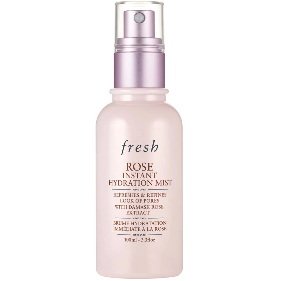 Fresh Rose Instant Hydration Mist in a pale pink bottle with a lavender pump dispenser, shown on a plain white background.