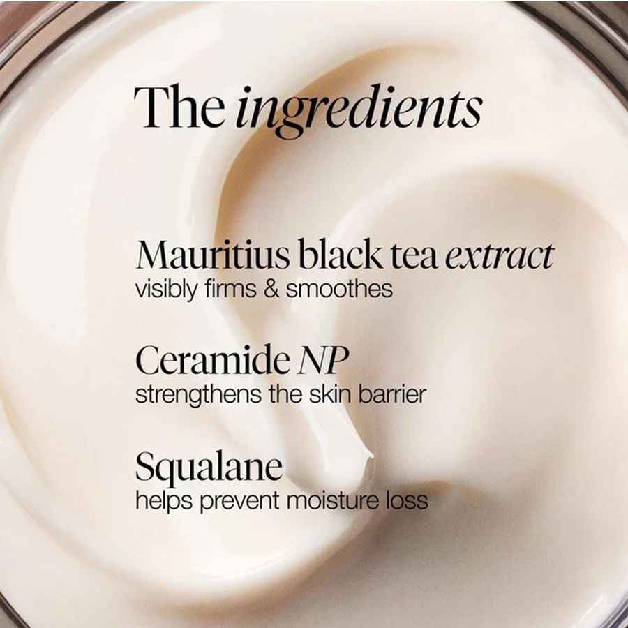Close-up of a cream-colored cosmetic product with text overlay reading 'The ingredients' and listing Mauritius black tea extract, Ceramide NP, and Squalane.
