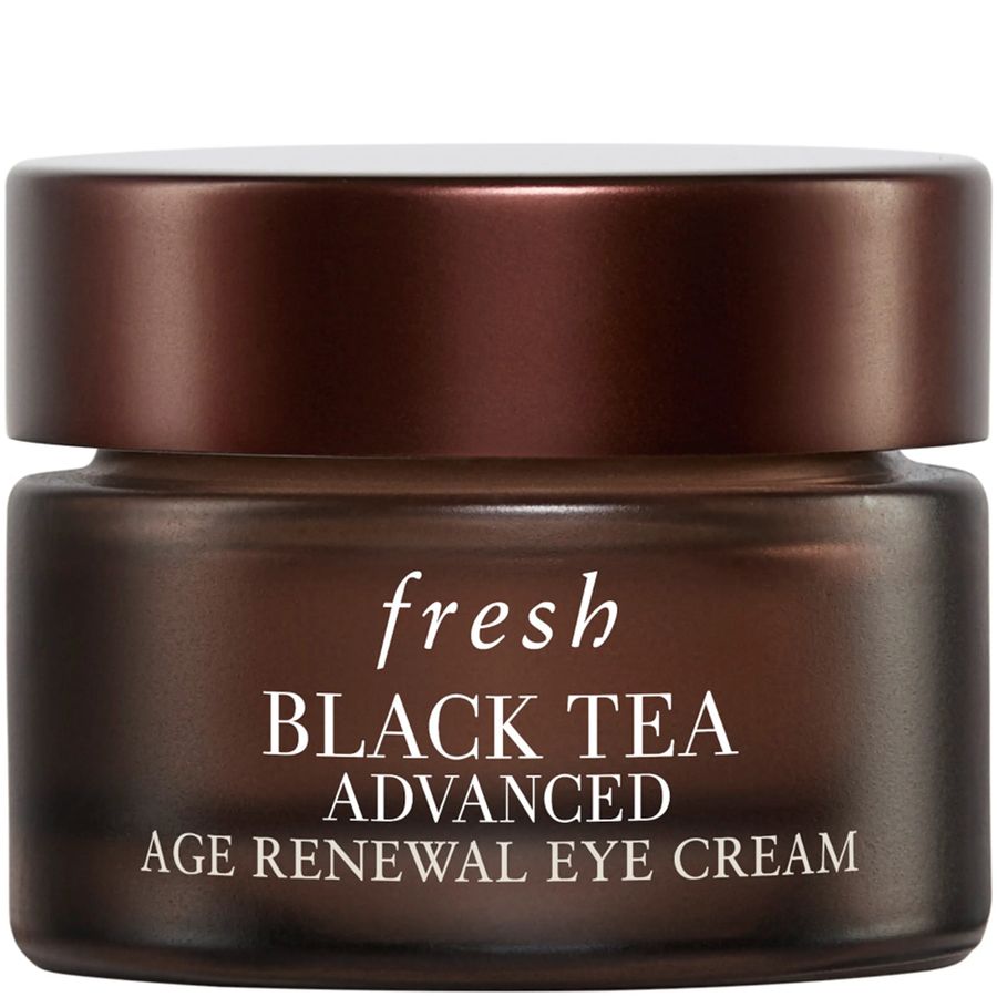 Fresh Black Tea Advanced Age Renewal Eye Cream in a dark brown jar with a matching lid, on a white background.