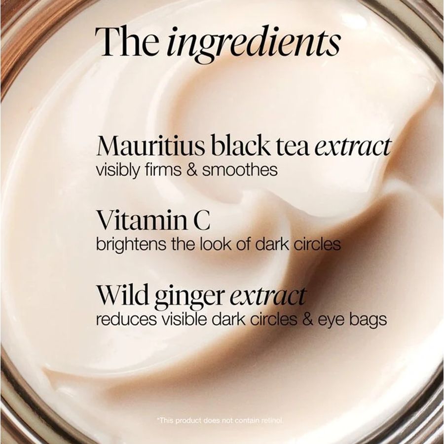 Close-up of a cream-colored cosmetic product in a clear jar, with text overlay reading 'The ingredients' and listing Mauritius black tea extract, Vitamin C, and Wild ginger extract.