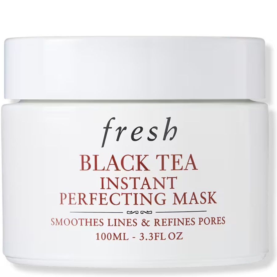 White jar of Fresh Black Tea Instant Perfecting Mask, 100ml, with text "Smoothes lines & refines pores".
