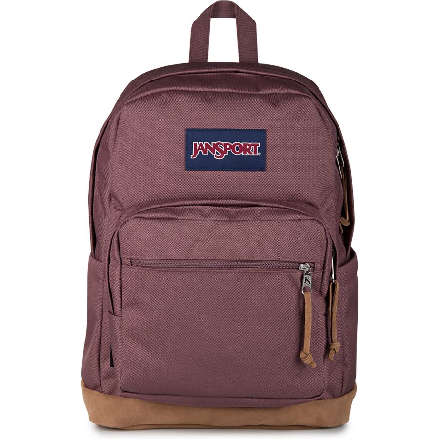 A Jansport backpack in a dusty plum purple color with a brown base and a navy blue logo patch on the front.