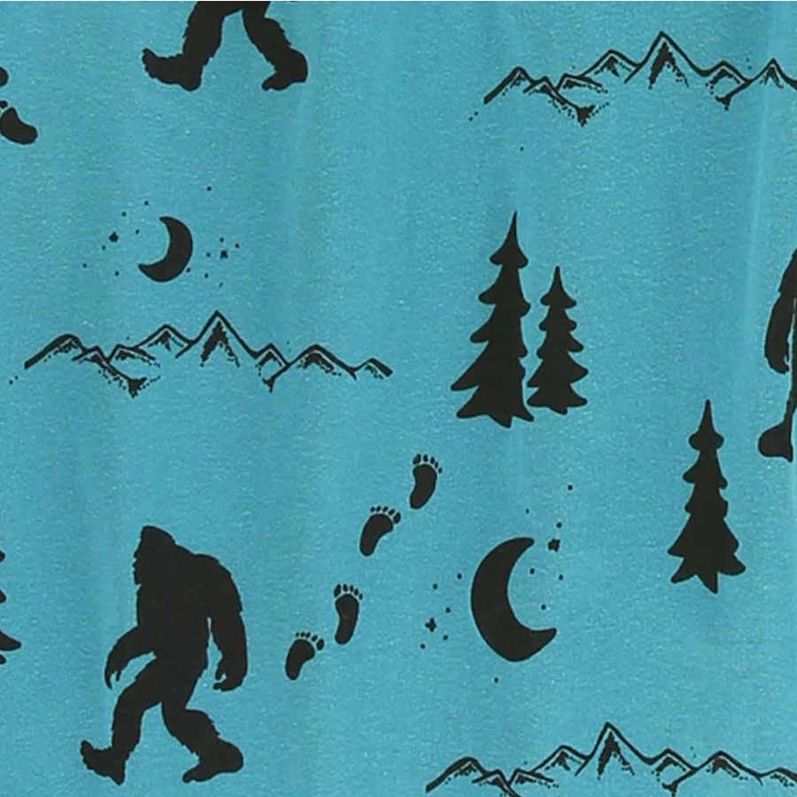 Black silhouette pattern of Bigfoot, footprints, pine trees, mountains, and crescent moons on turquoise.