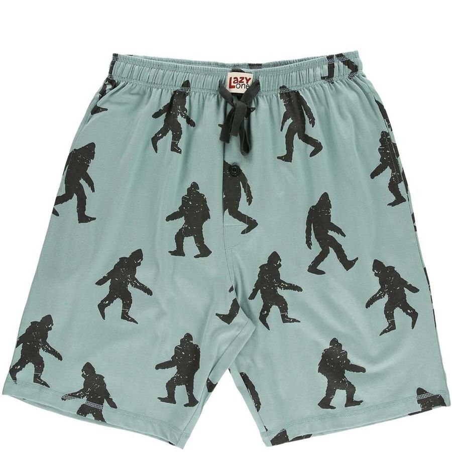 Light blue-green drawstring shorts with an allover black print of Bigfoot silhouettes, shown flat against a white background.