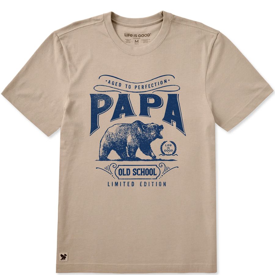 Beige t-shirt with blue graphic of a bear and text on a white background