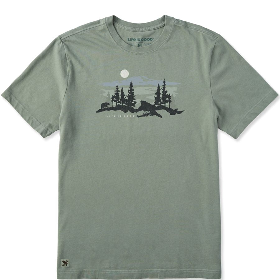 Green t-shirt with nature graphic on a white background