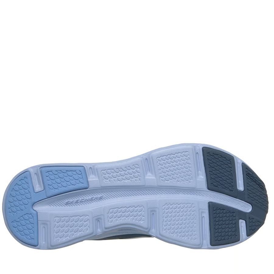 Close-up of a shoe sole with tread pattern on a white background