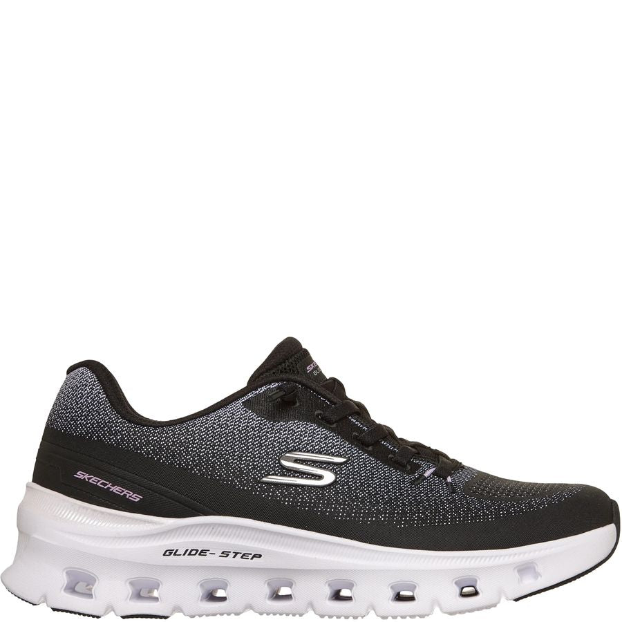 Black sneaker with white sole on a white background