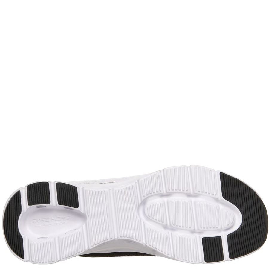 Close-up of a shoe sole with white and black design on a white background