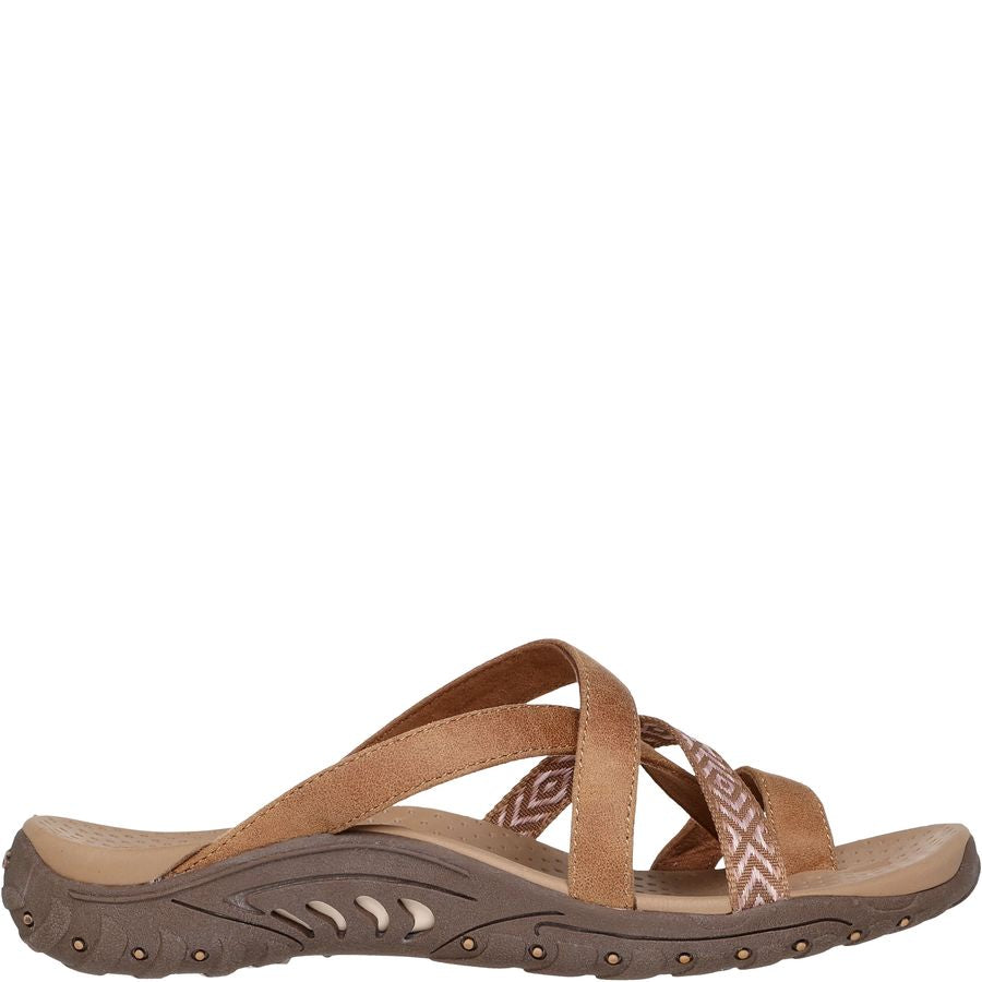 Brown sandal with criss-cross straps on a white background