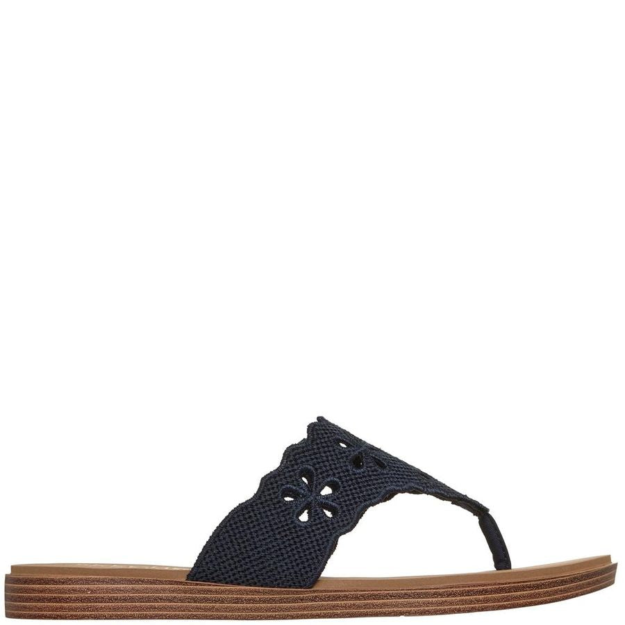 Navy sandal with a brown sole on a white background