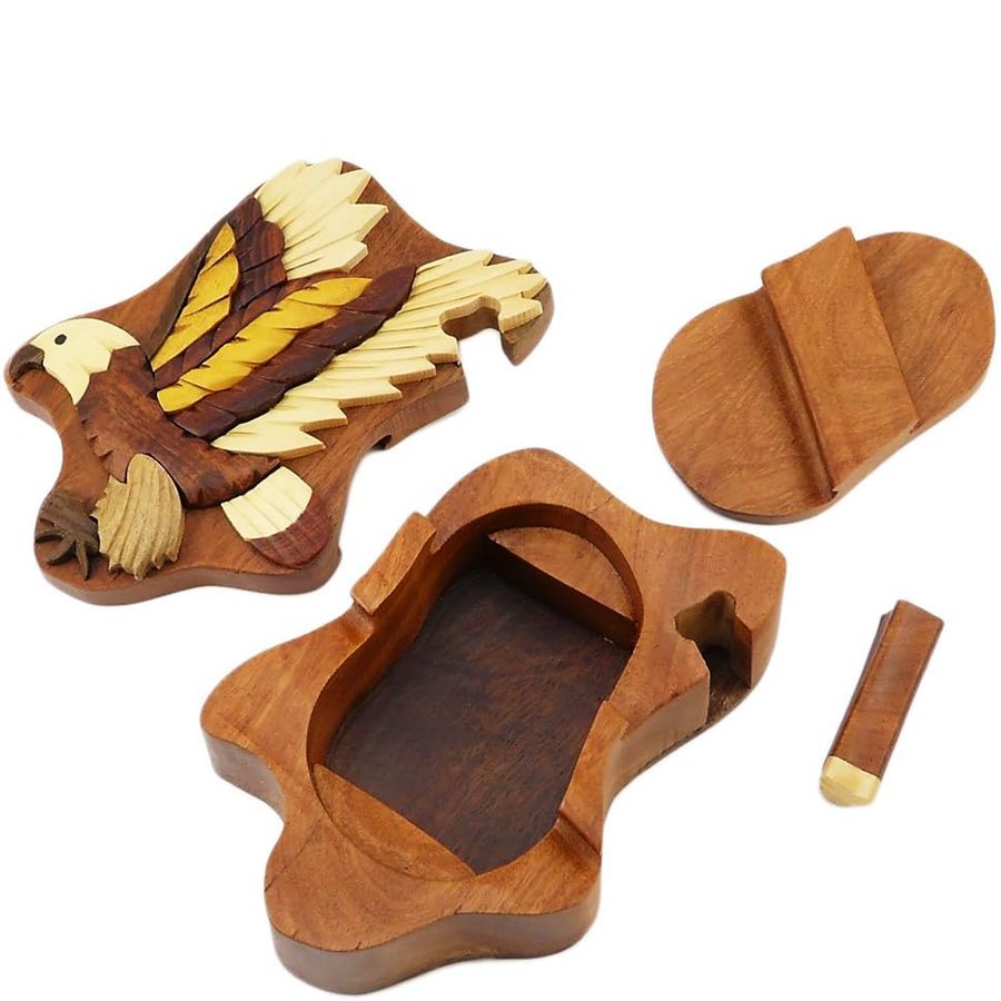 Handcrafted Carved Wood Puzzle Box with Secret Compartment, opened with pieces laid out.