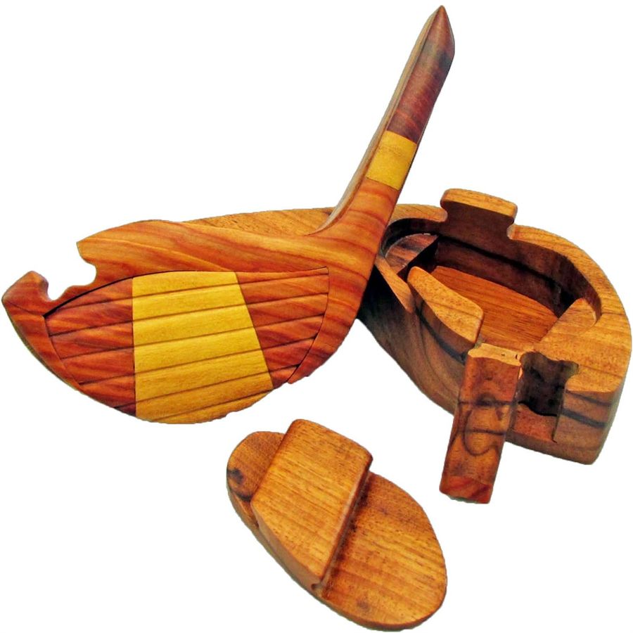 Handcrafted Carved Wood Puzzle Box with Secret Compartment, opened and pieces laid out.