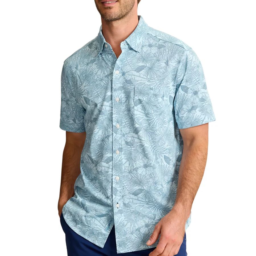 Man wearing a light blue patterned shirt on a white background