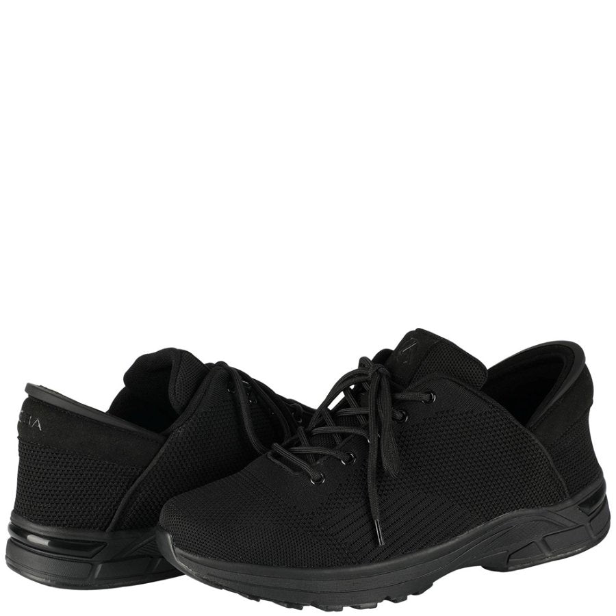 Black athletic shoes on a white background