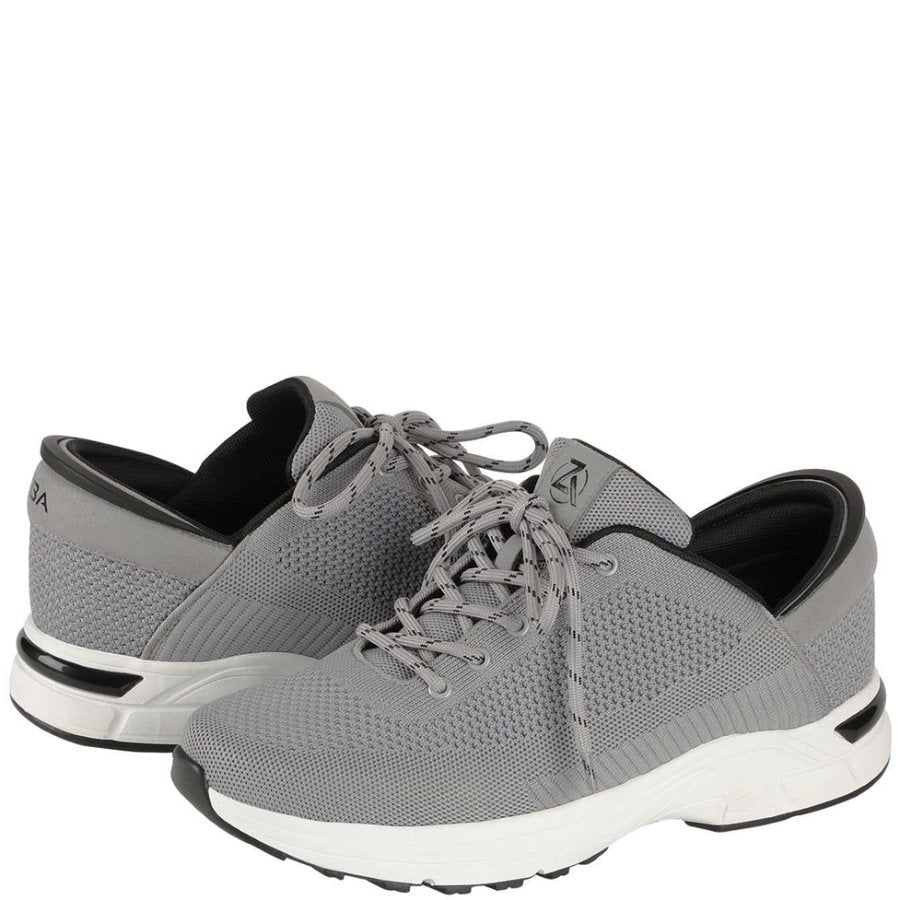 Gray sneakers with white soles on a white background