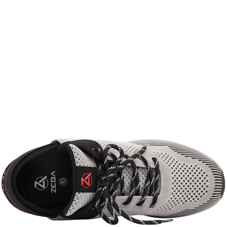 Gray athletic shoe with black sole and visible Zeba branding on a white background