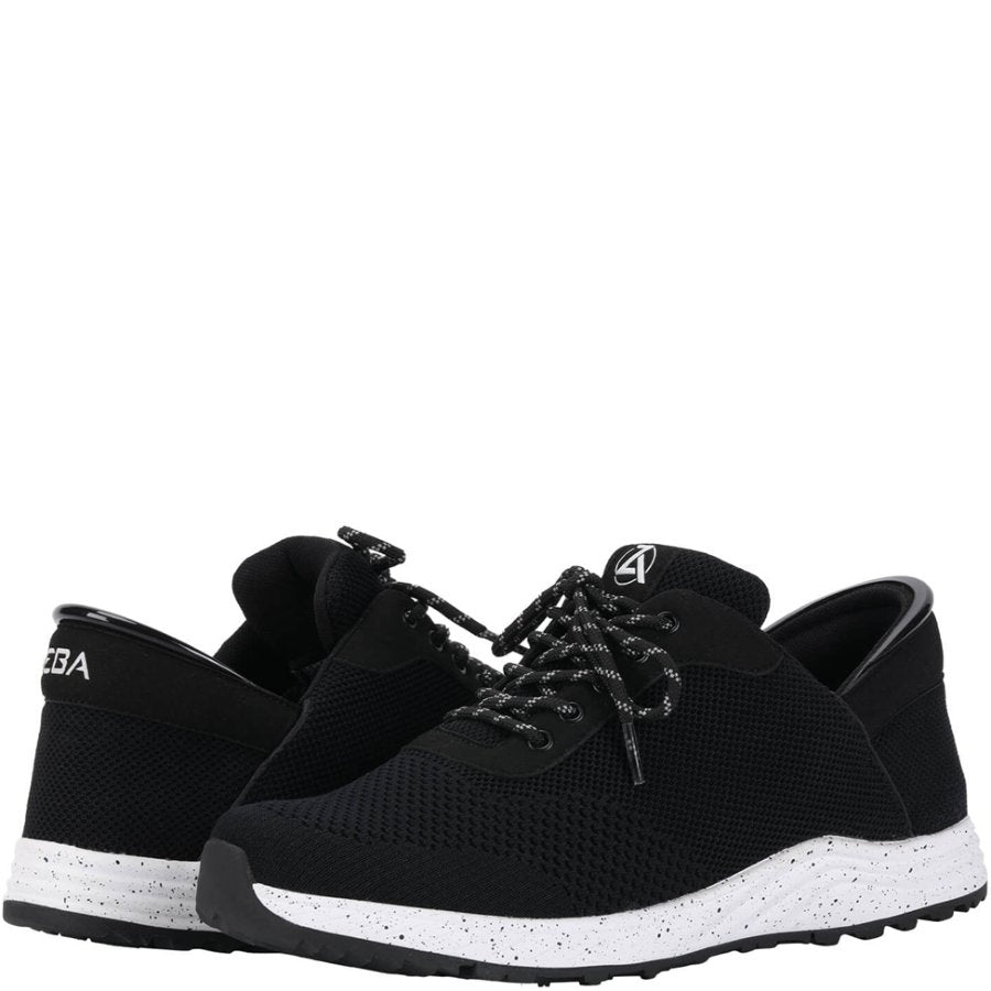 Black sneakers with white soles on a white background